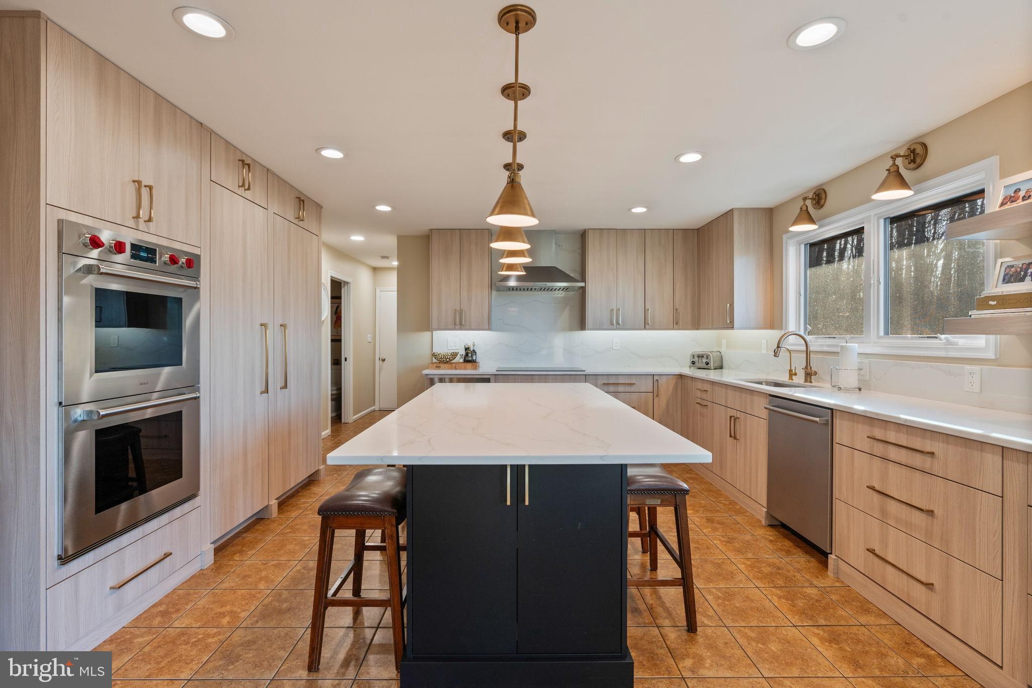 2104 Highland Ridge Drive Phoenix, MD 21131 - Photo 16 of 88 Modern kitchen with sleek cabinetry and Island.