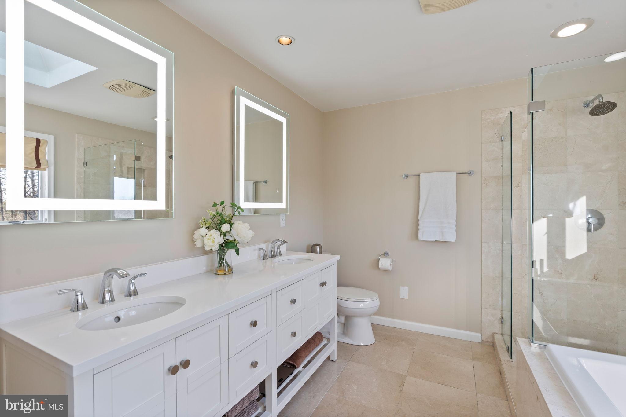 2104 Highland Ridge Drive Phoenix, MD 21131 - Photo 37 of 88 Sleek modern bathroom with elegant finishes.