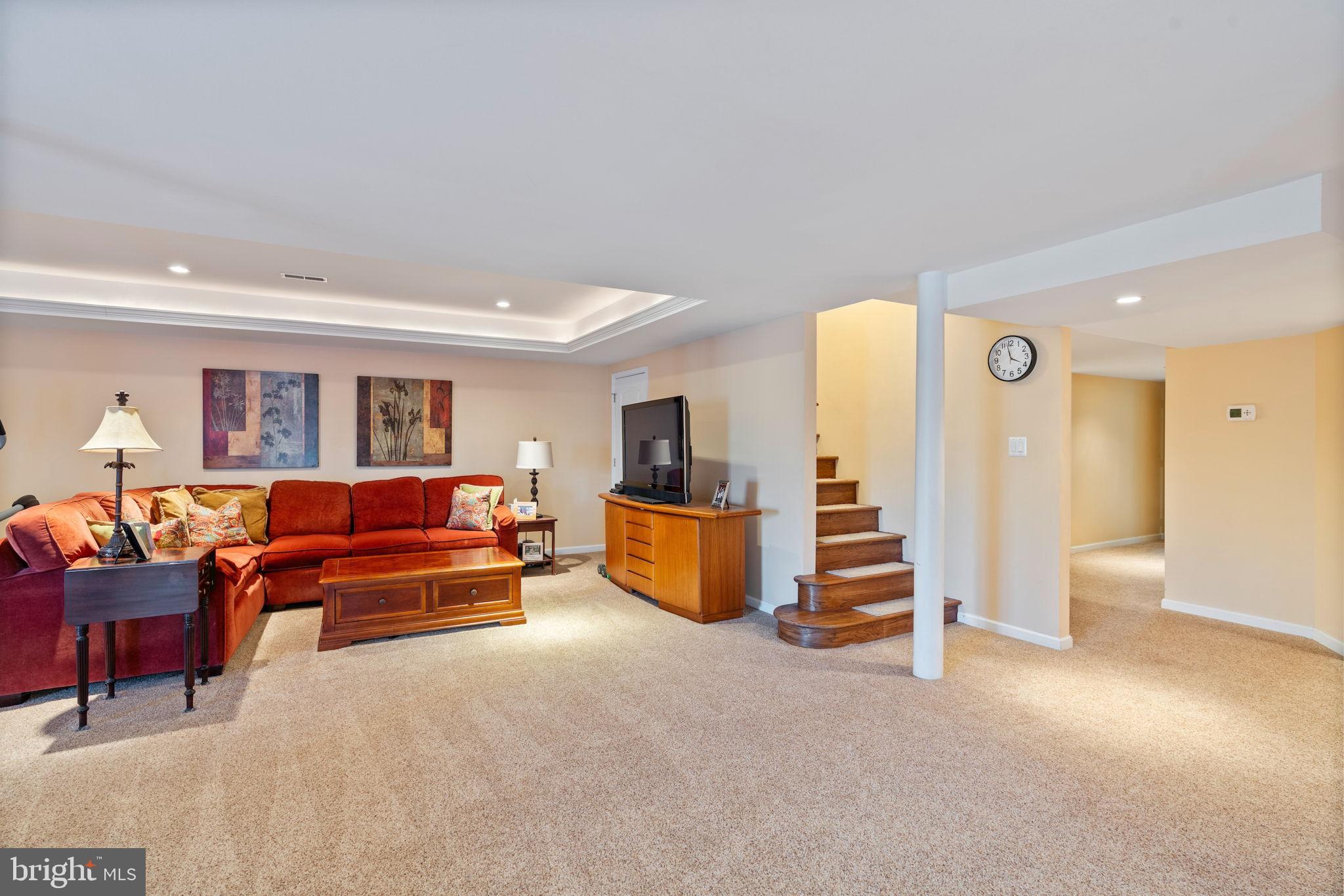 2104 Highland Ridge Drive Phoenix, MD 21131 - Photo 50 of 88 Spacious basement retreat with warm ambiance.