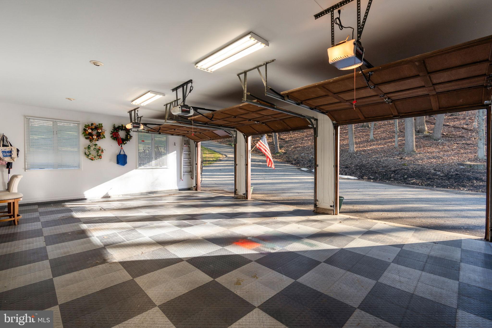 2104 Highland Ridge Drive Phoenix, MD 21131 - Photo 78 of 88 Spacious garage with natural light and charm.