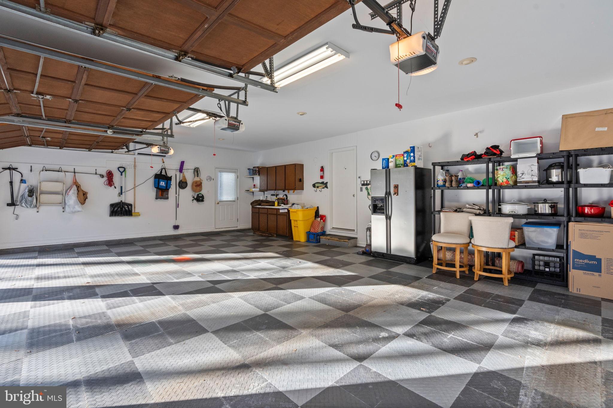 2104 Highland Ridge Drive Phoenix, MD 21131 - Photo 79 of 88 Spacious garage with organized storage options.