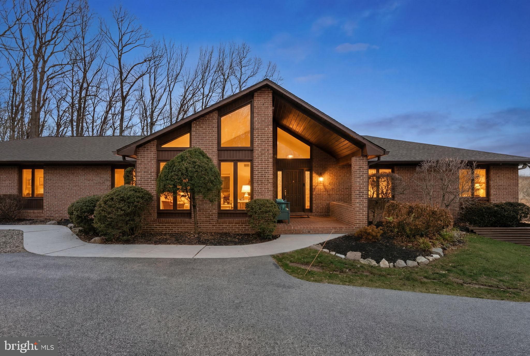 2104 Highland Ridge Drive Phoenix, MD 21131 - Photo 82 of 88 Elegant brick home at twilight's glow.