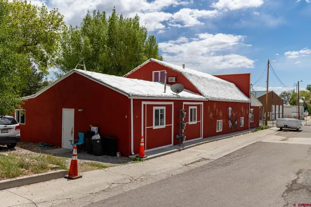 a car parked in front of a house