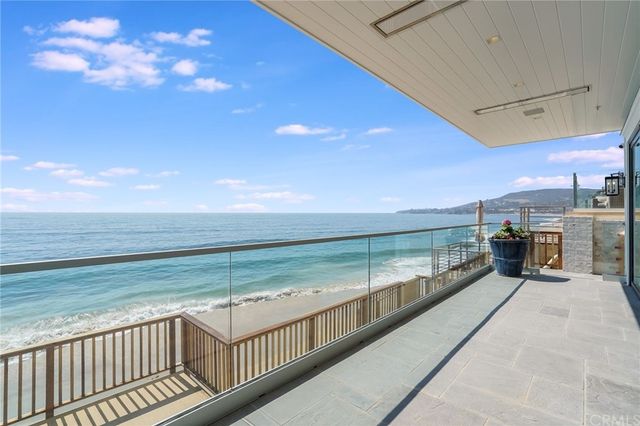 a outdoor space with patio furniture and potted plants