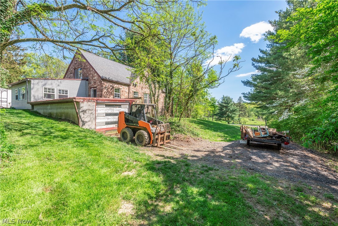 343 Bellus Road Hinckley, OH 44233 - Photo 48 of 49 View of yard with second driveway & attached one car garage