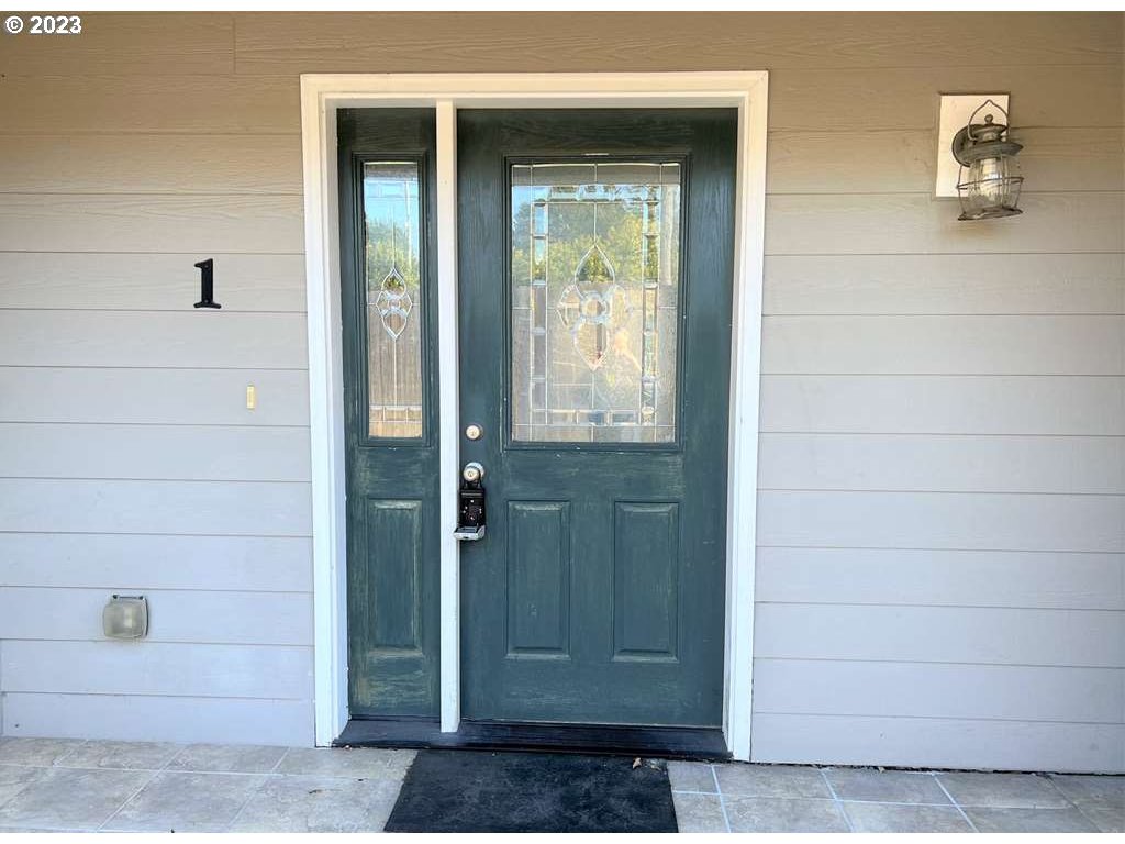 819 Easy Street, Unit 1 Brookings, OR 97415 - Photo 1 of 25 a view of front door