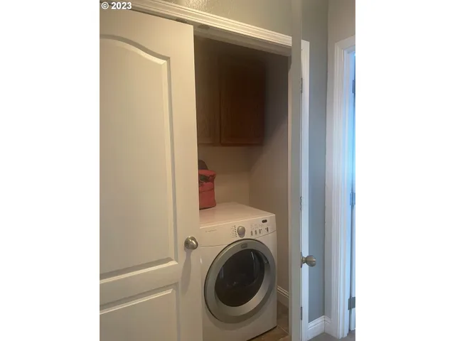 a bedroom with furniture and a bed