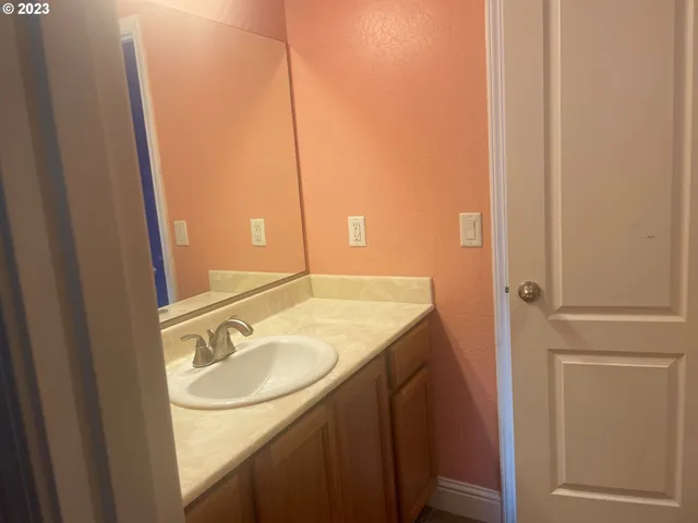 a bathroom with a toilet and sink