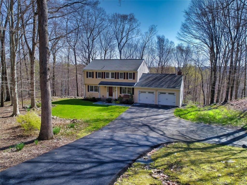 92 Valeview Road Wilton, CT 06897 - Photo 1 of 1 a view of a house with a yard and sitting area