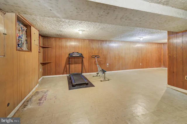 a view of a hallway with entryway