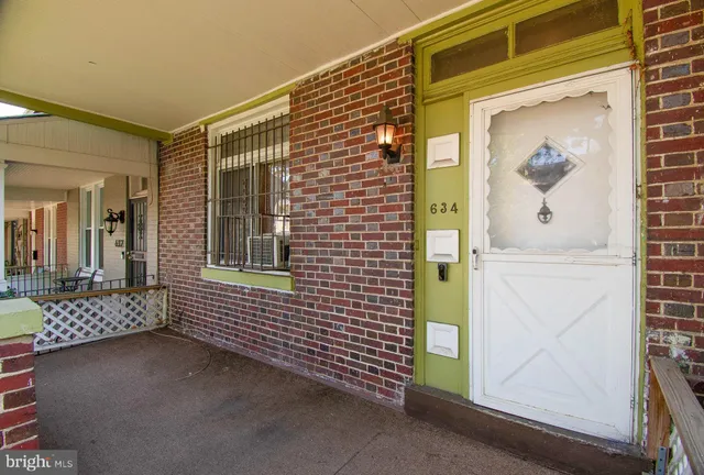 a view of a door and chair in the room