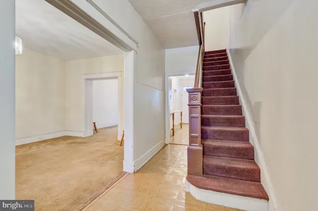 a view of an entryway with staircase