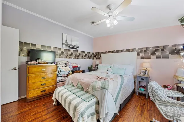 a view of a porch with furniture and wooden floor