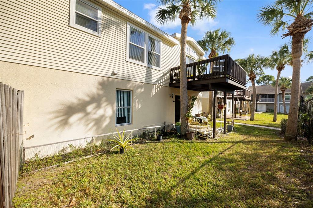 7641 Sailwinds Pass Port Richey, FL 34668 - Photo 31 of 59 a view of a house with a backyard