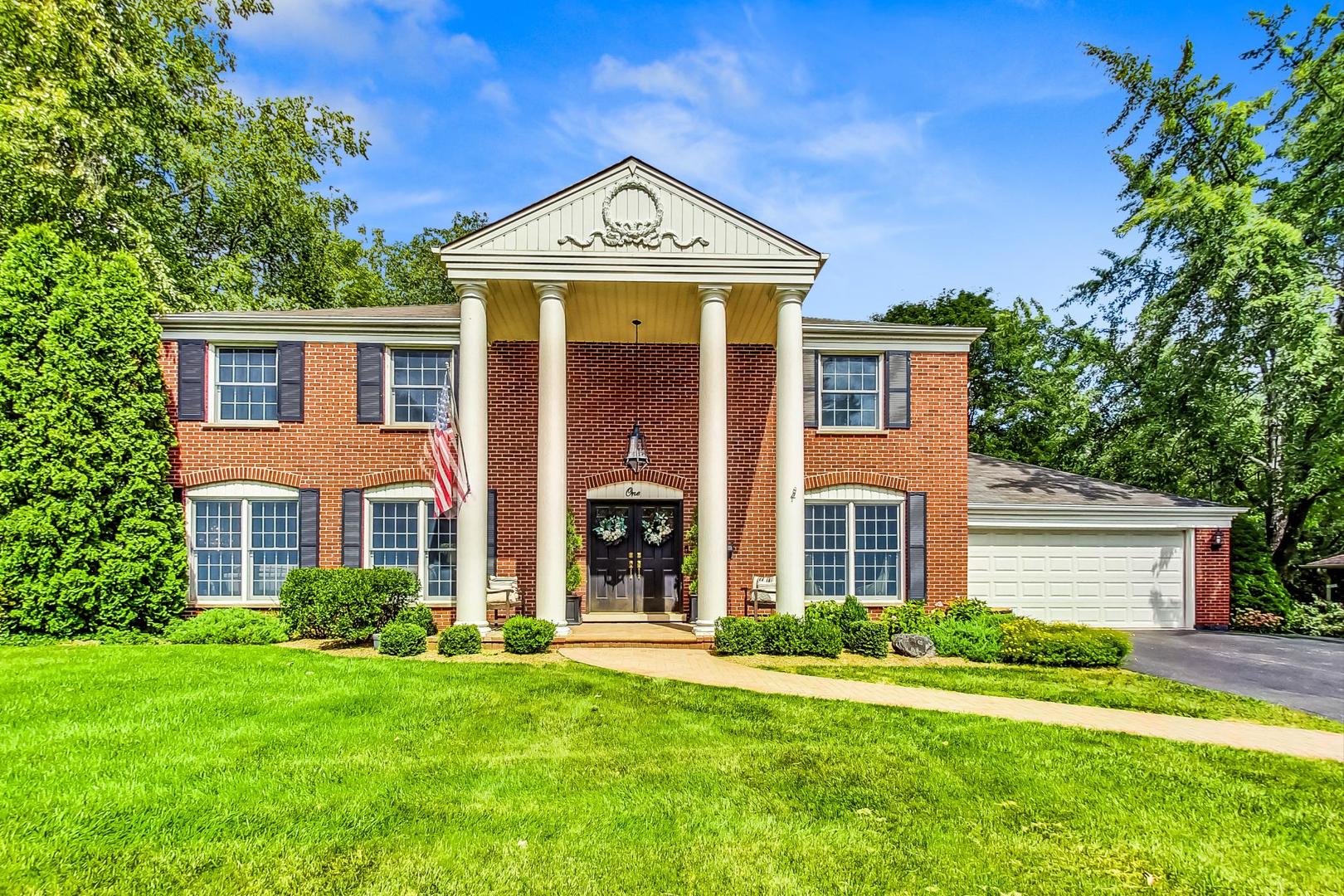 1 Knoll Ridge Road Rolling Meadows, IL 60008 - Photo 1 of 58 front view of a house with a yard