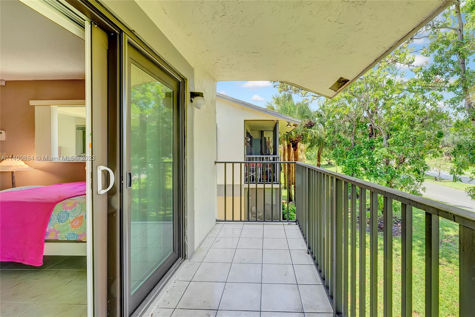 677 Trace Circle, Unit 210 Deerfield Beach, FL 33441 - Photo 18 of 21 a view of a balcony