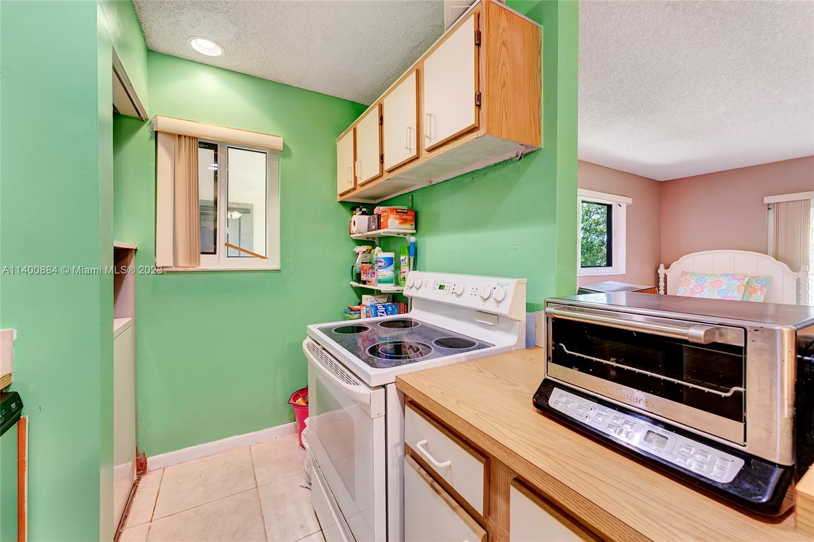 677 Trace Circle, Unit 210 Deerfield Beach, FL 33441 - Photo 6 of 21 a room with storage and utility