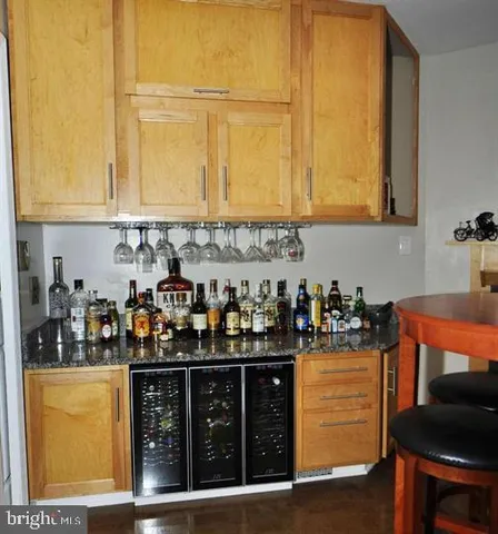 a room with lots of bottles of alcohol