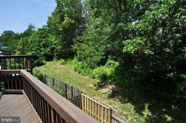 a view of balcony and yard