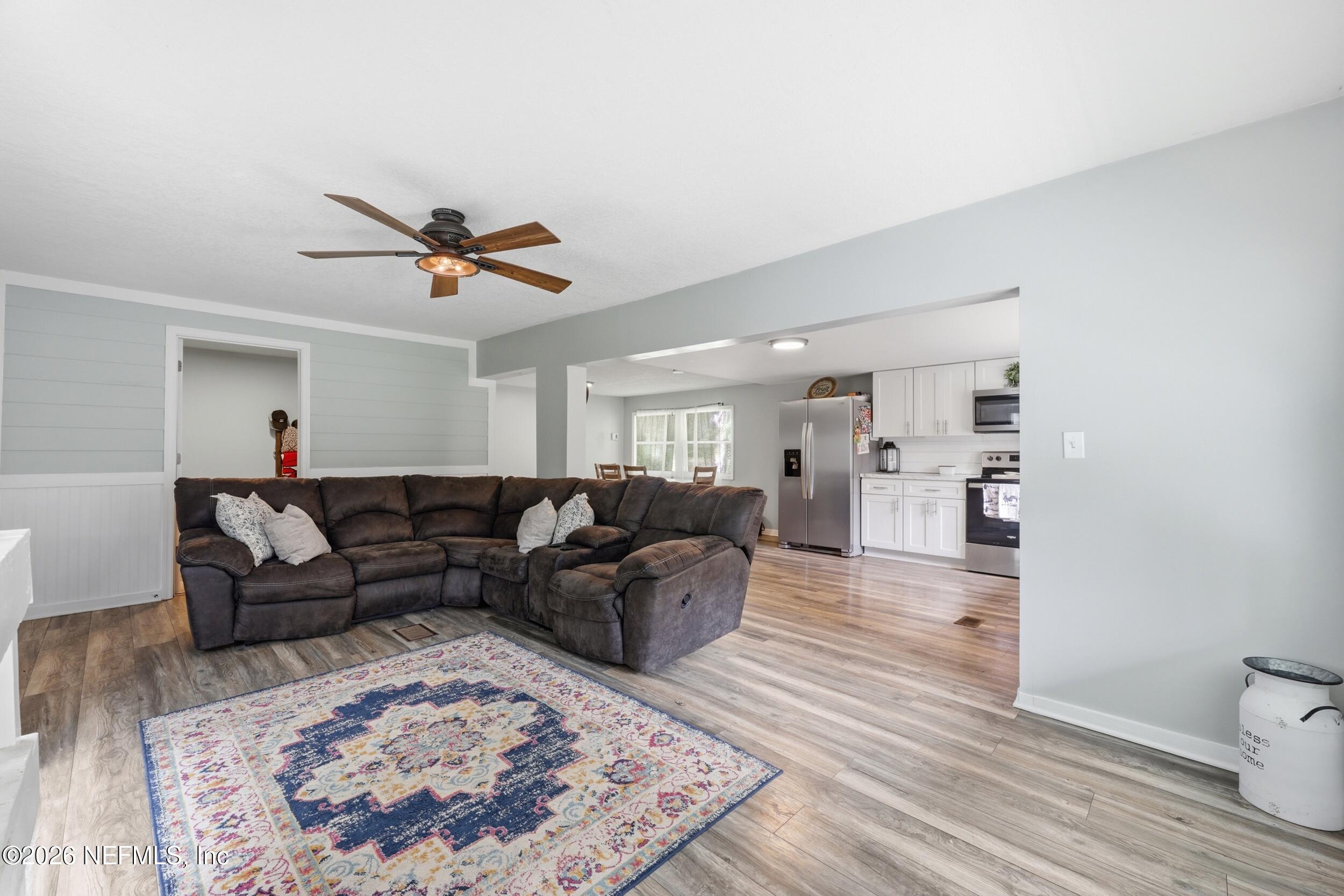 754 McCargo Street South Jacksonville, FL 32221 - Photo 12 of 44 living room into kitchen