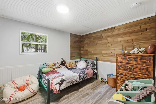 a bed room with a bed and a couch
