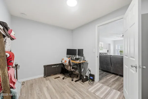 a workspace with furniture and bedroom