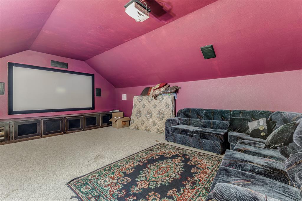2245 Homestead Lane Plano, TX 75025 - Photo 17 of 25 a living room with furniture and a flat screen tv