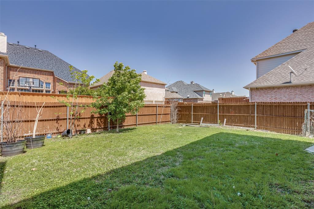 2245 Homestead Lane Plano, TX 75025 - Photo 25 of 25 a view of a backyard