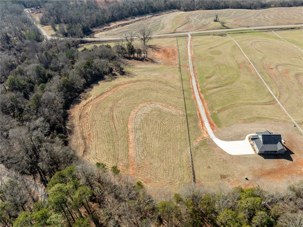 367 Dobbins Road Townville, SC 29689 - Photo 14 of 16 This sprawling estate offers vast open spaces, perfect for tranquil living and potential agricultural pursuits.
