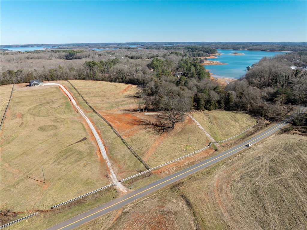 367 Dobbins Road Townville, SC 29689 - Photo 9 of 16 Expansive acreage offering serene lake views and a tranquil, natural setting for your future home.