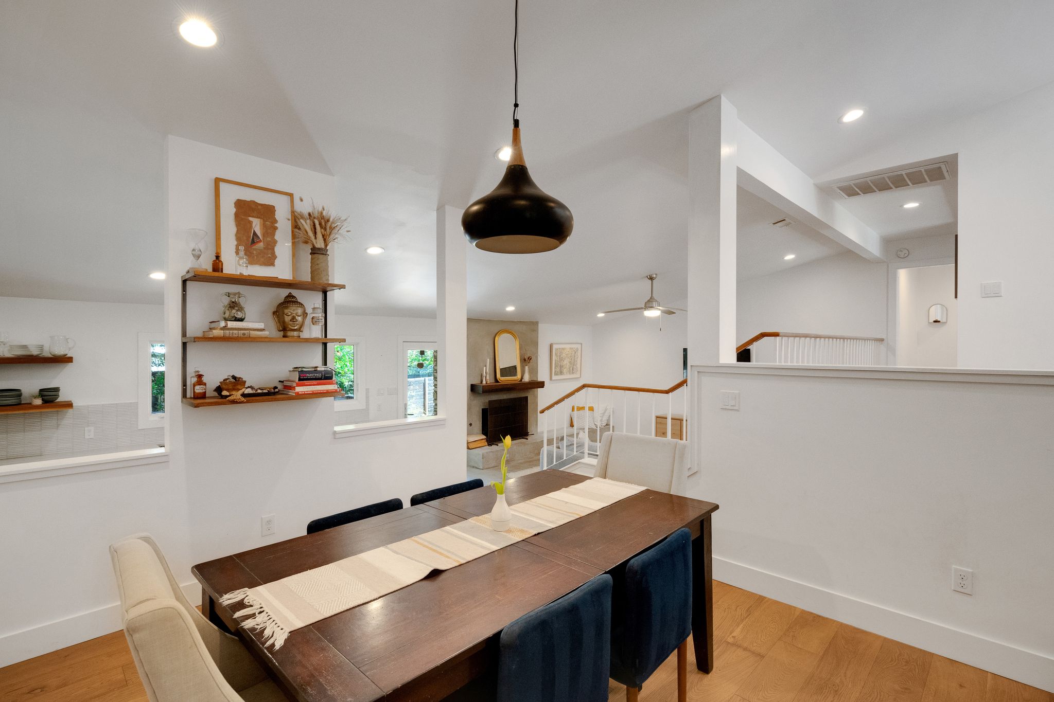 2502 Side Cove Austin, TX 78704 - Photo 11 of 35 a room with stainless steel appliances kitchen island a table and chairs
