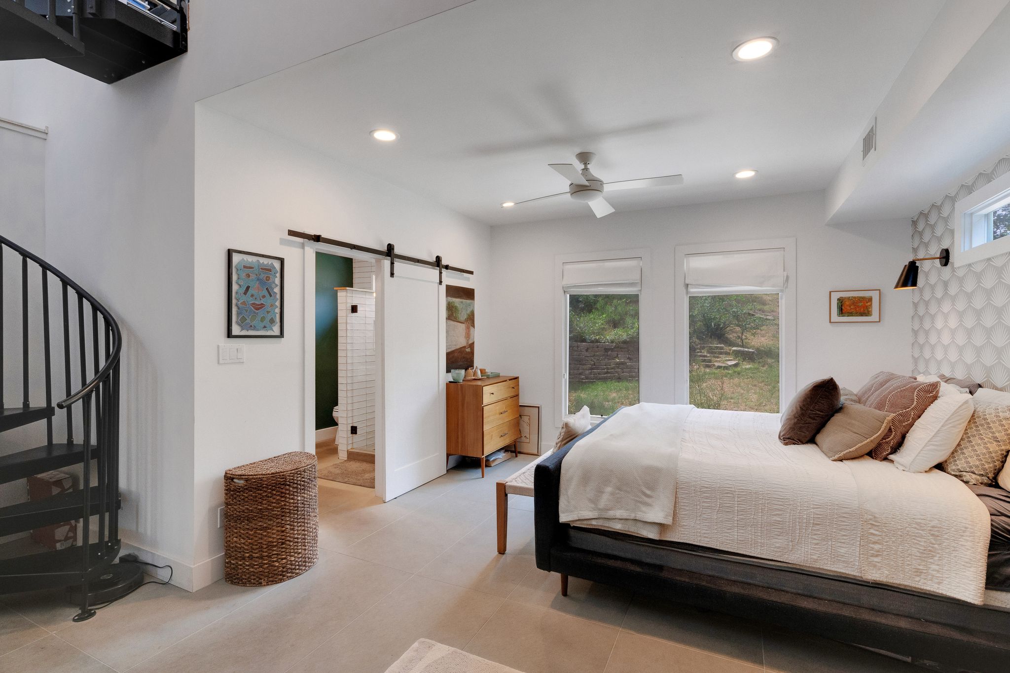 2502 Side Cove Austin, TX 78704 - Photo 15 of 35 a bedroom with a bed couch and window