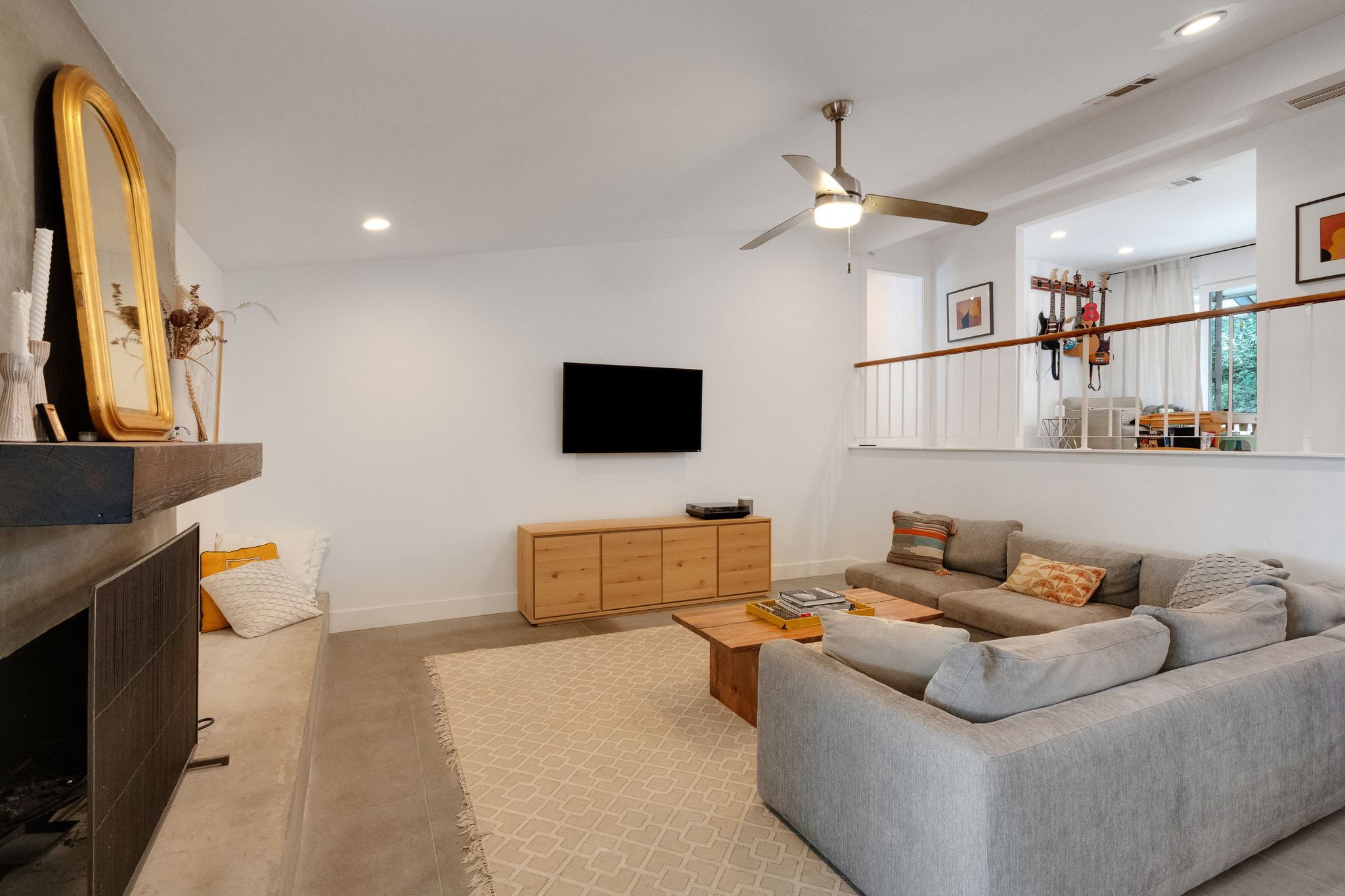 2502 Side Cove Austin, TX 78704 - Photo 15 of 30 a living room with furniture and a flat screen tv