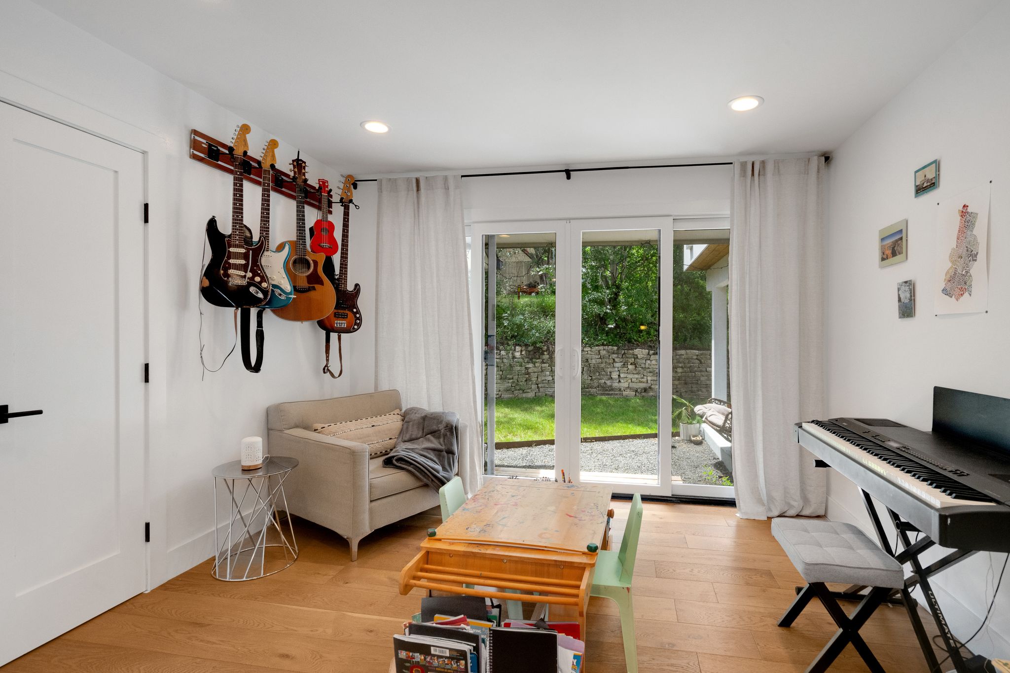 2502 Side Cove Austin, TX 78704 - Photo 17 of 35 a bedroom with furniture and a window