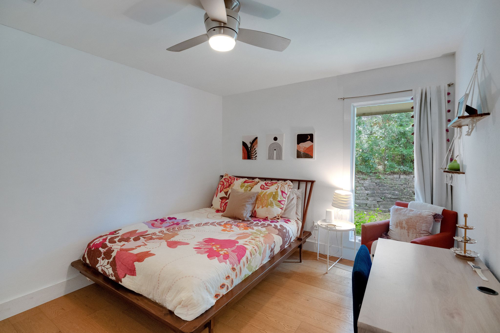 2502 Side Cove Austin, TX 78704 - Photo 22 of 30 a bedroom with a bed and wooden floor