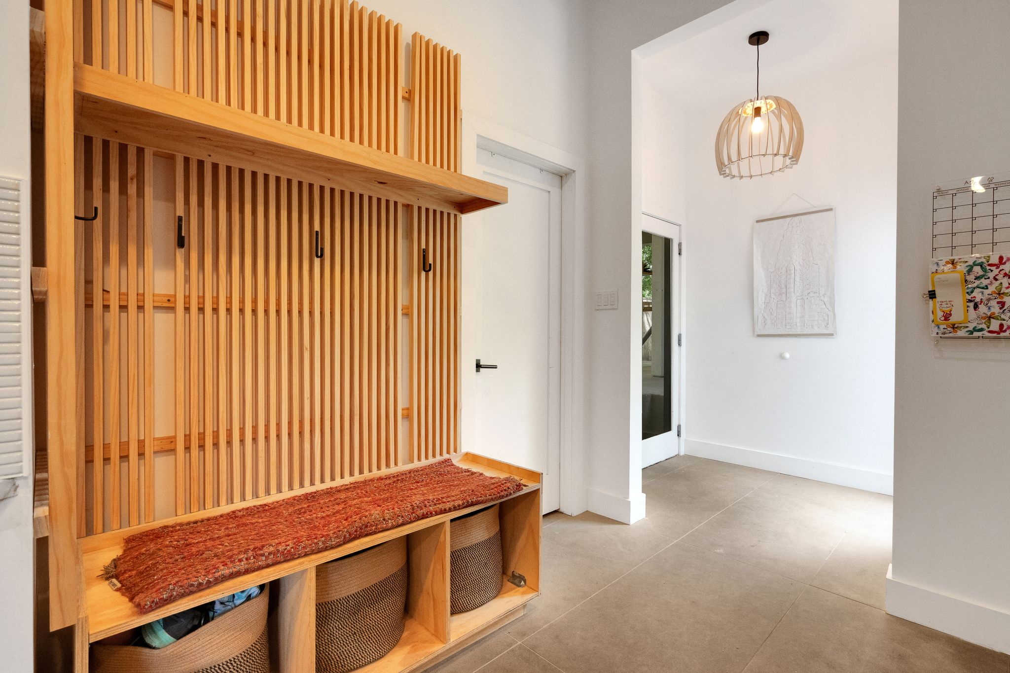 2502 Side Cove Austin, TX 78704 - Photo 23 of 35 a view of an entryway with a chandelier