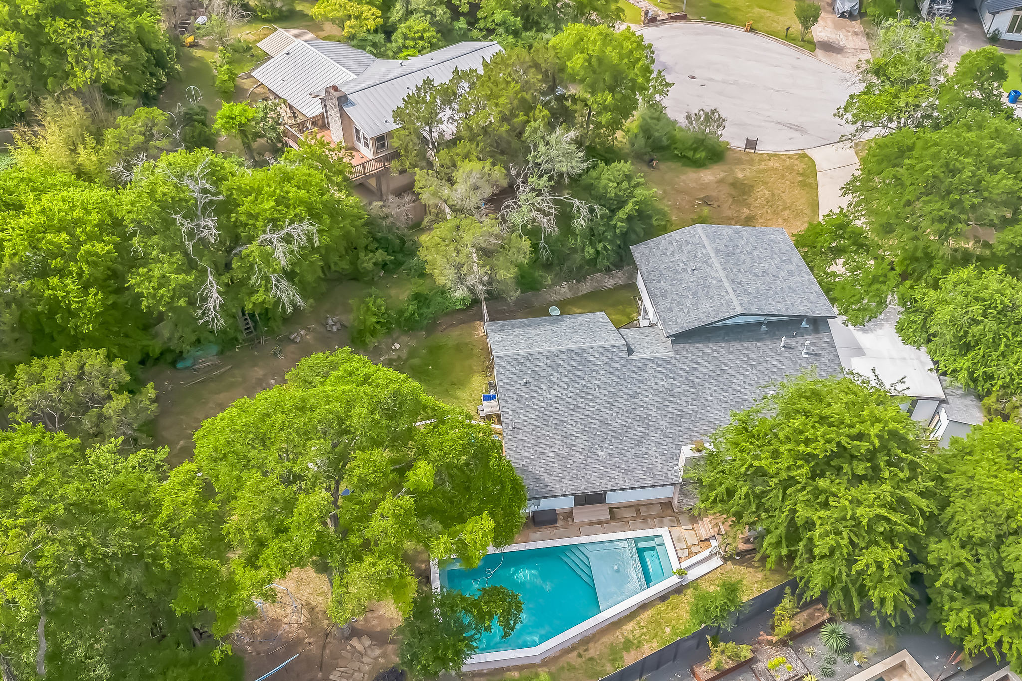 2502 Side Cove Austin, TX 78704 - Photo 31 of 35 an aerial view of a house with a yard