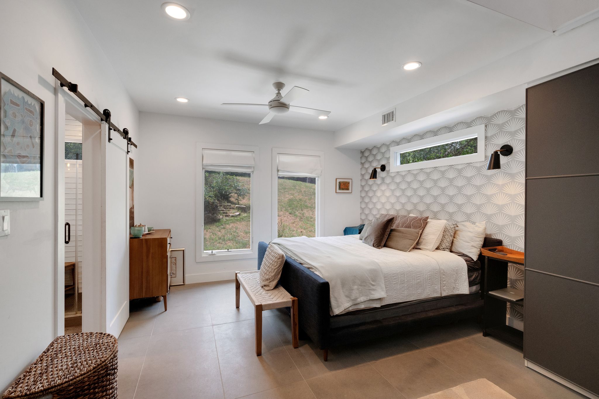 2502 Side Cove Austin, TX 78704 - Photo 5 of 30 a bedroom with a bed couch and a window