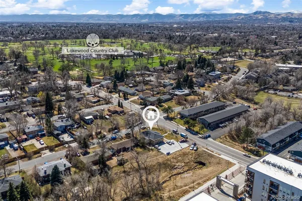 a view of a city with a lake