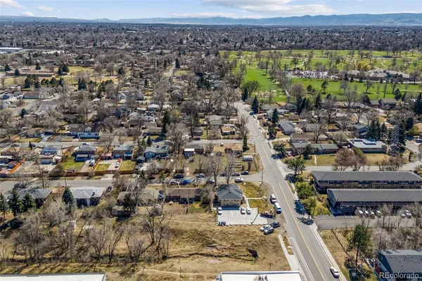 a view of a house with snow on the wall