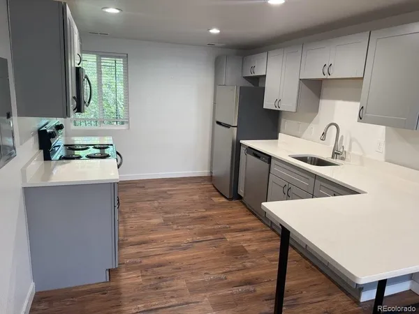 a room with furniture and a flat screen tv