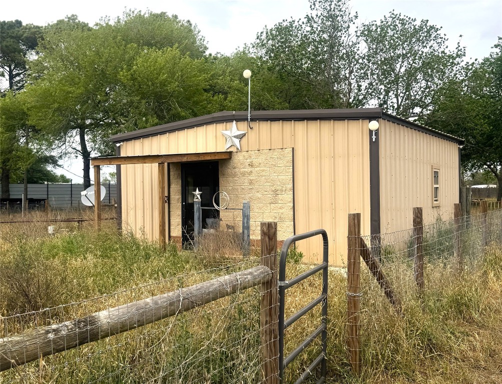4501 Baker Road Needville, TX 77461 - Photo 6 of 8 a view of swimming pool with a patio