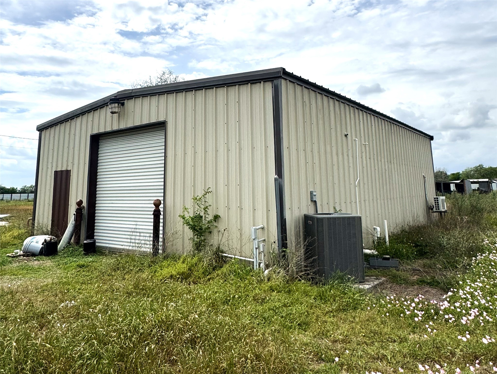 4501 Baker Road Needville, TX 77461 - Photo 7 of 8 a backyard of a house with lots of green space