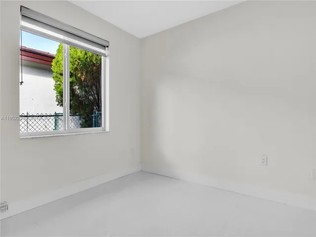 a view of a window in an empty room