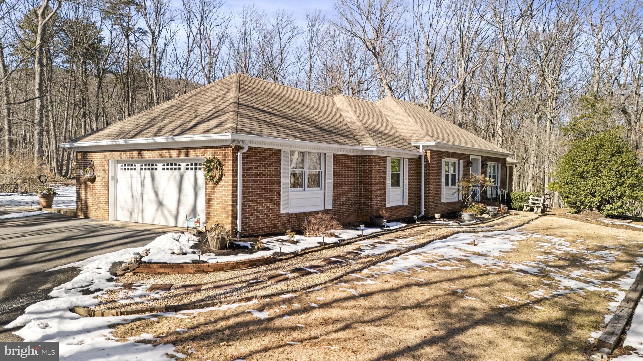 All Brick home with side load garage