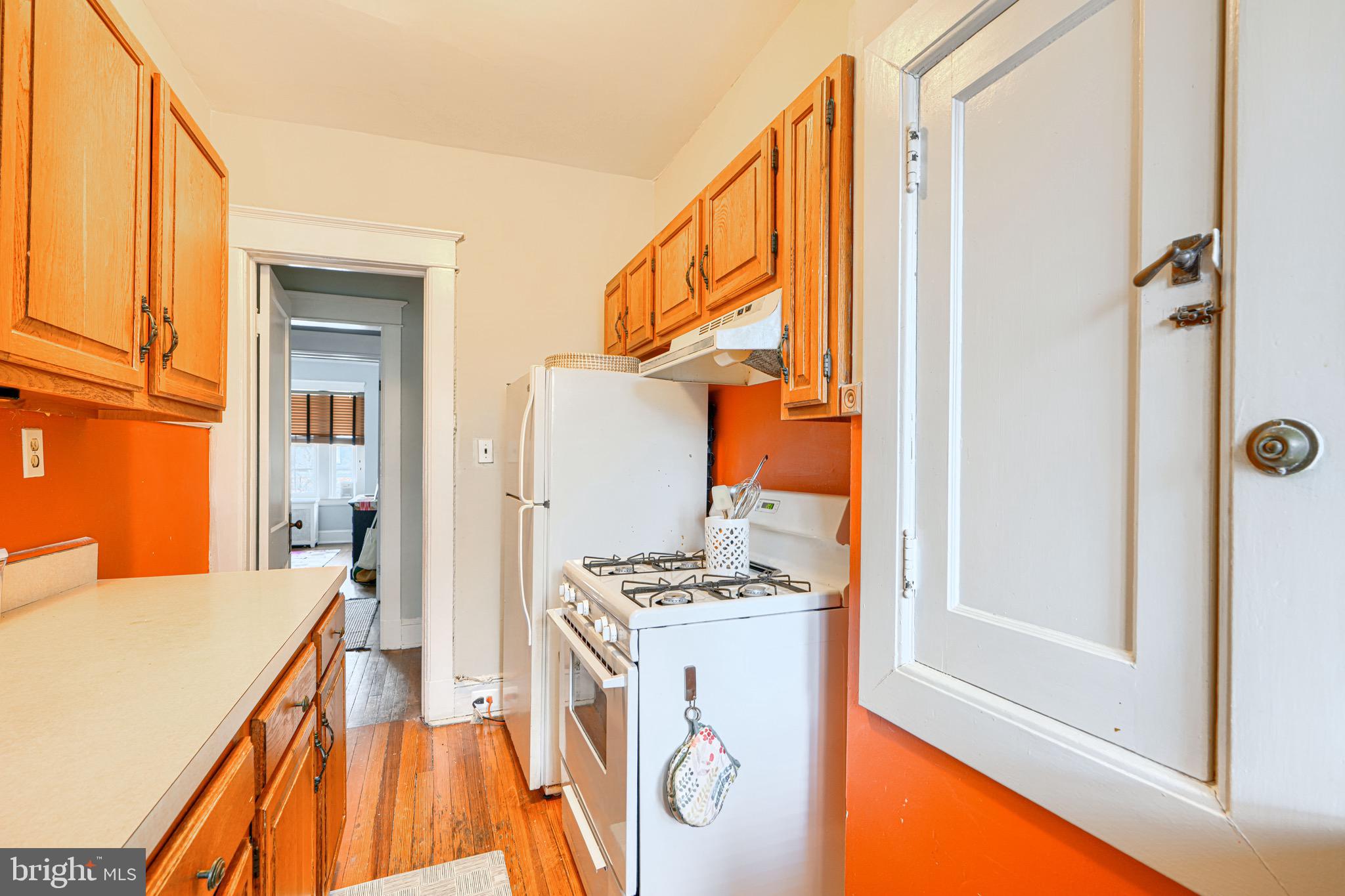 607 Somerset Road, Unit 5 Baltimore, MD 21210 - Photo 19 of 38 a view of kitchen and utility room
