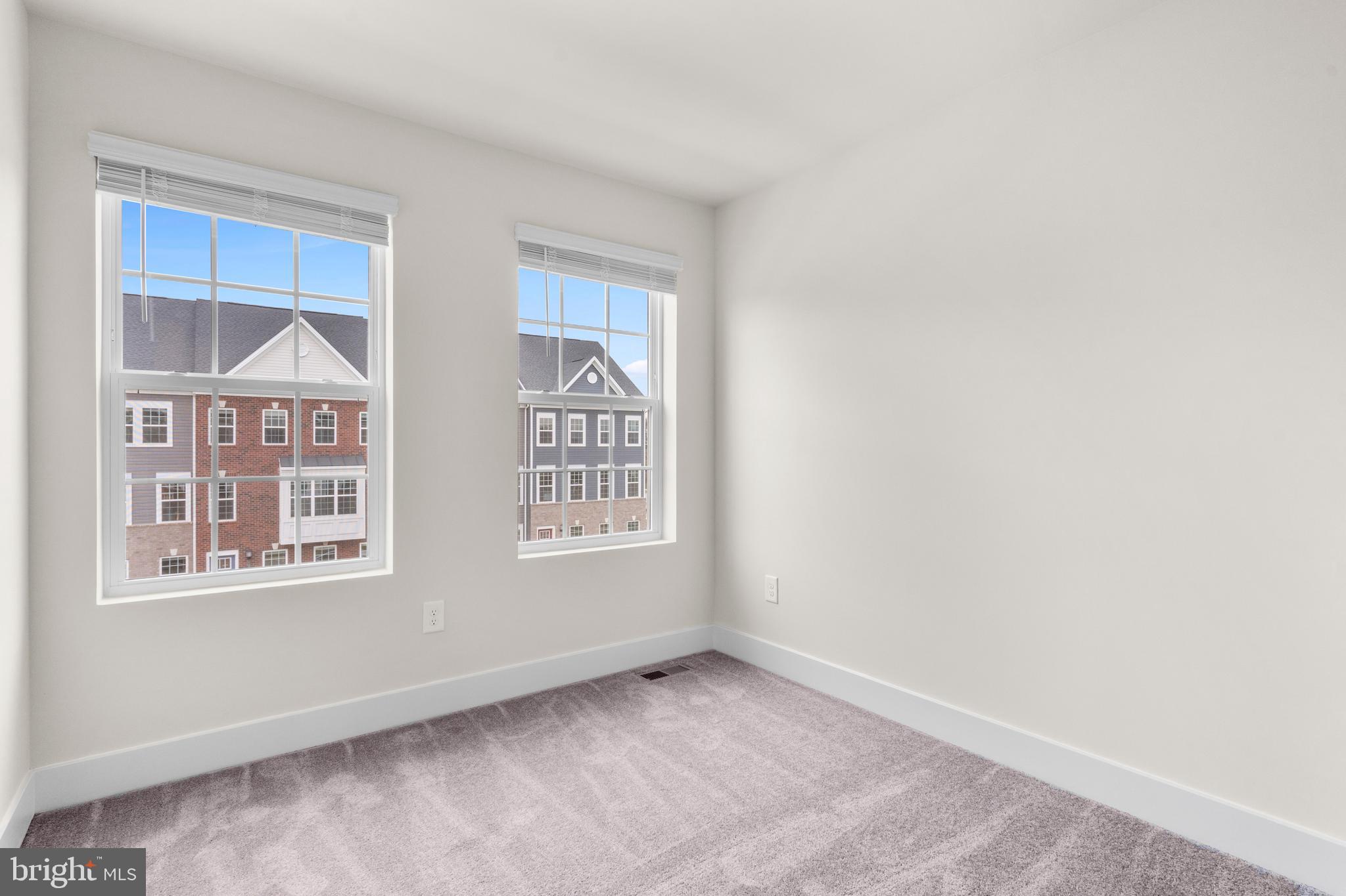 1826 Parham Way Windsor Mill, MD 21244 - Photo 25 of 37 a view of an empty room with a window