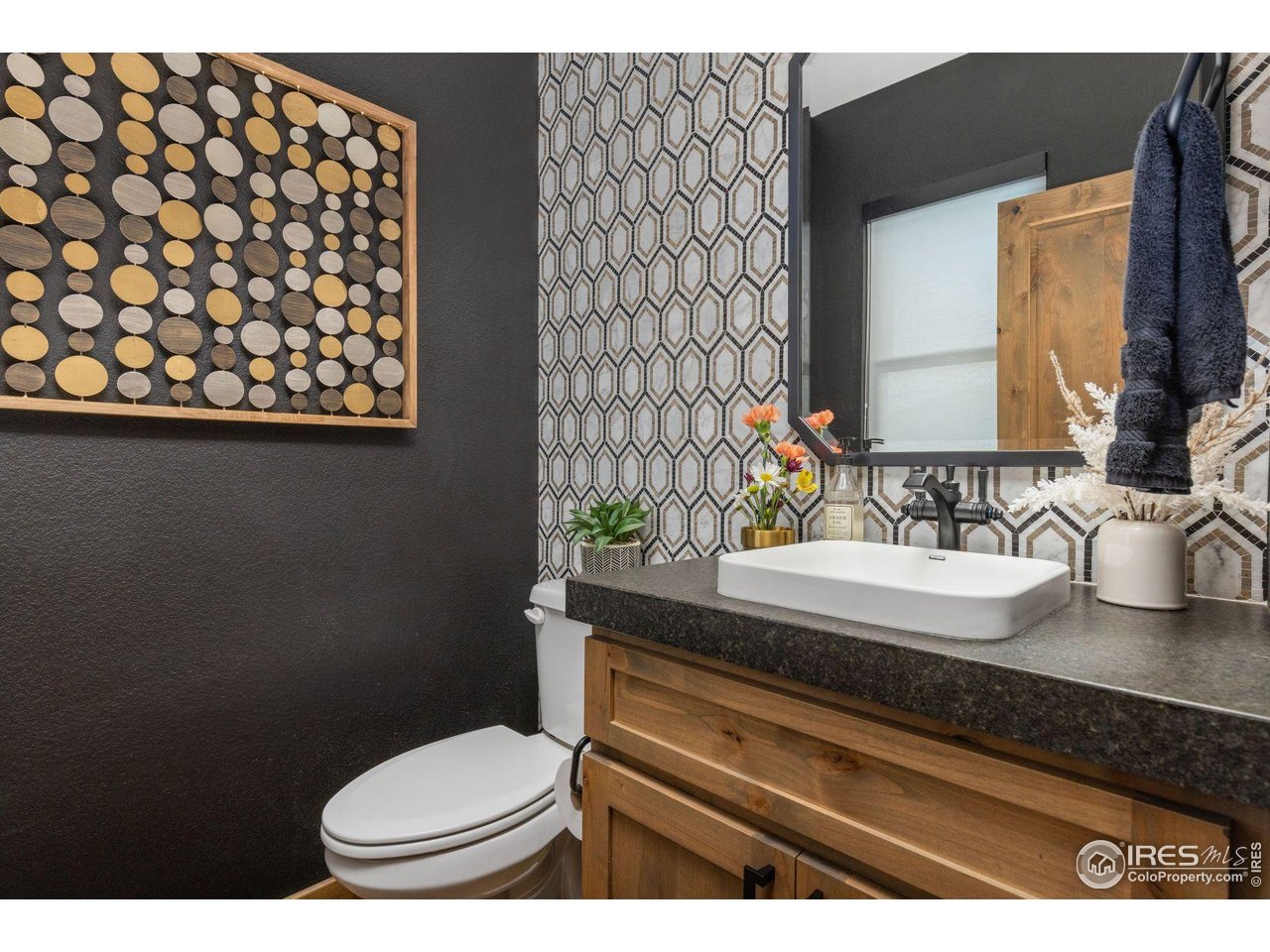 2734 Southwind Road Berthoud, CO 80513 - Photo 21 of 50 Main Floor Powder Room