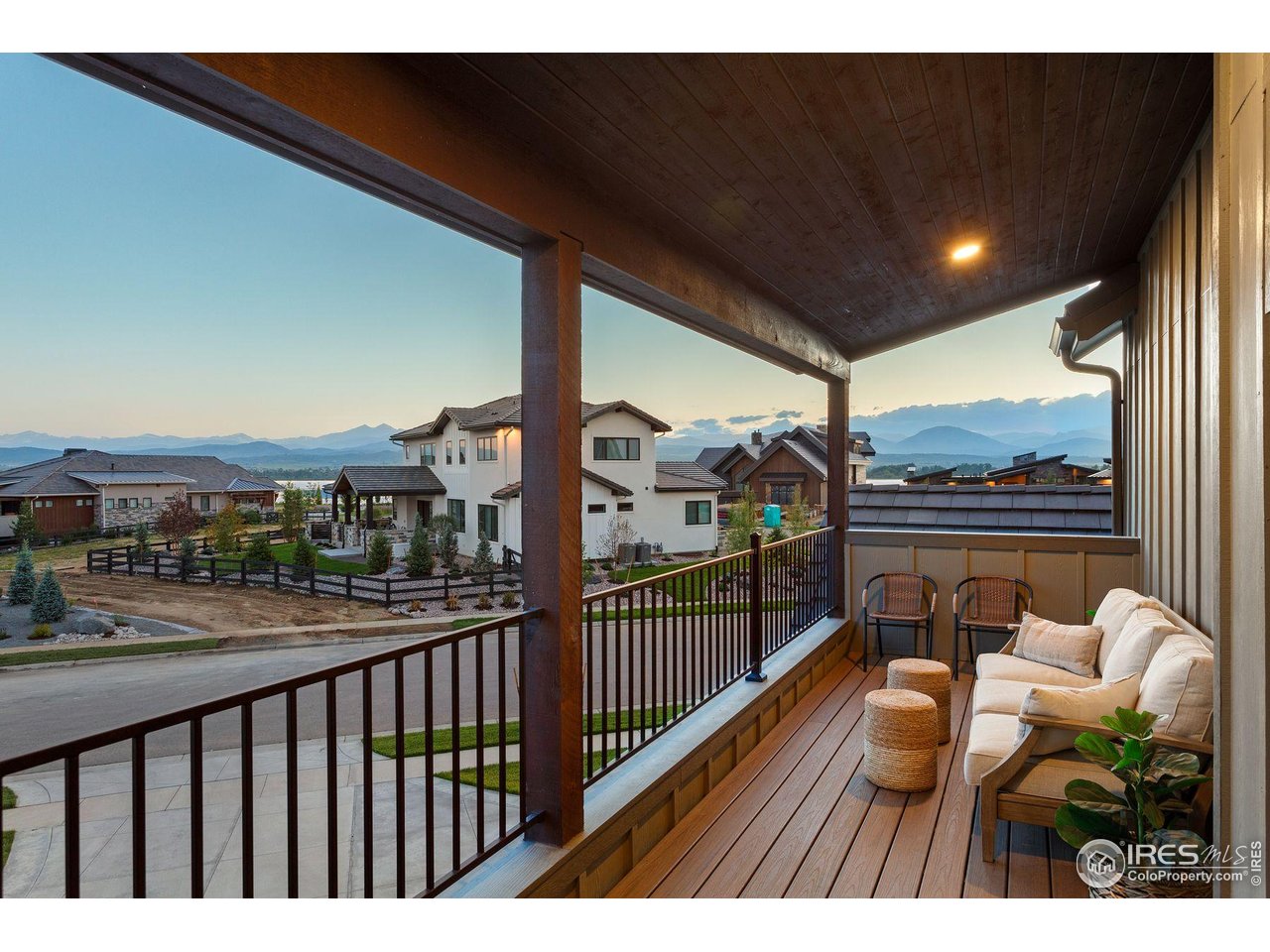 2734 Southwind Road Berthoud, CO 80513 - Photo 32 of 50 Balcony off Primary Suite offers Sunset Viewing Perfection