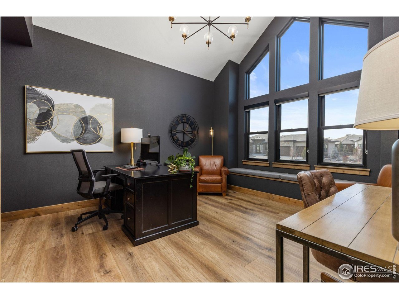 2734 Southwind Road Berthoud, CO 80513 - Photo 9 of 50 Office is highlighted by Soaring Windows, Storage and Walk-In Closet, and Barn Door